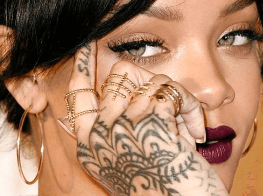 Tattoo:Nunsqkojaqe= Rihanna